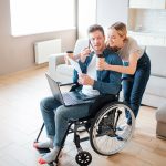 Young man sitting in wheelchair